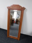 A hand painted framed hall mirror