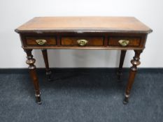 A late 19th century writing table CONDITION REPORT: Some veneer losses.