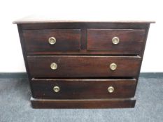 An Eastern hardwood four drawer chest