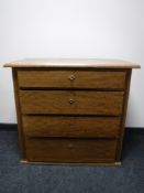 An early 20th century four drawer chest