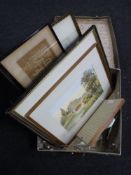 A vintage luggage case containing prints and watercolours