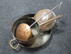 An antique copper twin handled oven dish together with a copper cast iron handled pan,