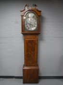 An inlaid mahogany eight day longcase clock with pendulum and weights