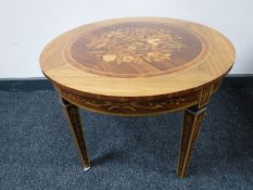 An inlaid mahogany occasional table