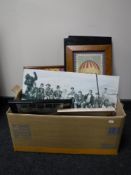 A box of framed prints, wall canvases, metal wall plaques, framed circus First Day Covers,