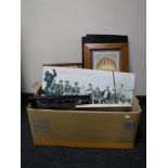 A box of framed prints, wall canvases, metal wall plaques, framed circus First Day Covers,