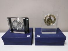 Two boxed contemporary glass mantel clocks