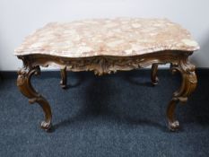 A French marble topped coffee table on carved walnut base