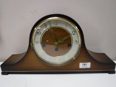 A German Hermle oak mantel clock with key CONDITION REPORT: There is no visible date.