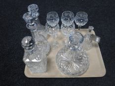A tray of four lead crystal decanters,