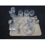 A tray of four lead crystal decanters,