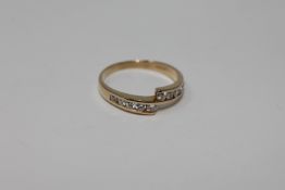 An 18ct gold 10 stone diamond ring,