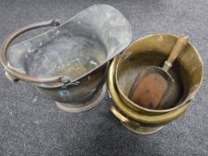 Two antique coal buckets together with a shovel