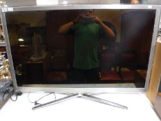 A Samsung model UE46C8705XS picture frame TV (continental wiring) with remote