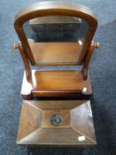 A Victorian mahogany dressing mirror and a Regency mahogany caddy