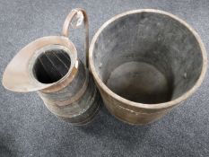An oak coopered coal bucket and a stick stand in the form of a jug