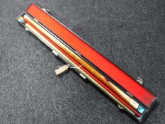 A two piece Riley snooker cue in case