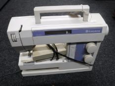 A Husqavarna electric sewing machine with foot pedal (continental wiring)