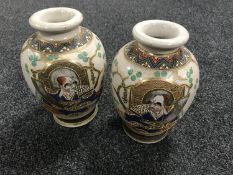 A pair of 20th century Japanese earthenware vases