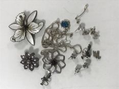 A collection of silver jewellery including a Norwegian enamel flower brooch