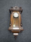 A mahogany cased wall clock by Jones & Company of Worcester