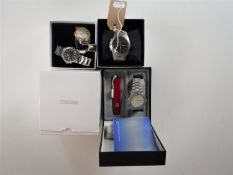 A boxed Swiss Army gents watch with pocket knife and two Seiko watches