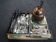 A tray of assorted stainless steel and plated table cutlery, carving set,