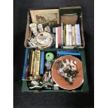 Two boxes of books, place mats, china flower posies, commemorative mugs,
