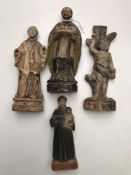 Four late 19th/early 20th century polychrome painted carved wooden religious figures,