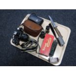 A tray of boxed Triang Railways engine, three carriages, pair of field glasses, Zenit camera,