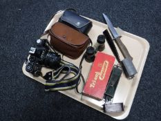 A tray of boxed Triang Railways engine, three carriages, pair of field glasses, Zenit camera,