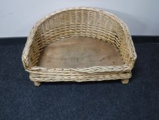 A wicker dog bed