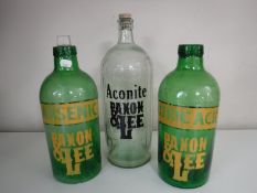 Three glass chemist's bottles