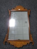 A walnut Chippendale style wall mirror