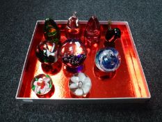 Nine assorted glass paperweights