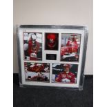 A framed Michael Schumacher sporting montage with signed cap