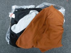 A box of new men's jumpers and skirt