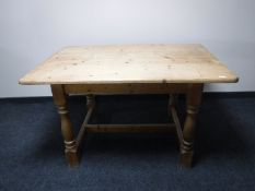 A pine farmhouse kitchen table