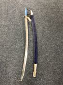 An Indian sabre in scabbard