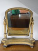 A Victorian pine dressing table mirror