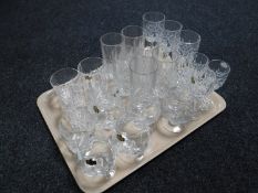 A tray of assorted lead crystal drinking glasses