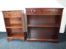 Two sets of mahogany open bookshelves