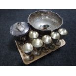 A tray of silver plated lion mask punch bowl and lidded ice bucket, six plated goblets,