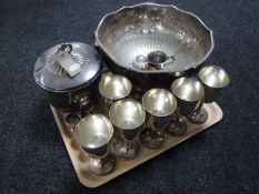 A tray of silver plated lion mask punch bowl and lidded ice bucket, six plated goblets,