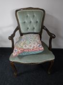 A French style armchair, upholstered in a green button dralon,