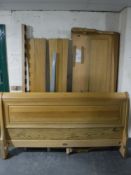 A contemporary six foot sleigh bed