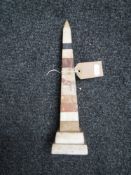 An early 20th century marble obelisk, height 28.