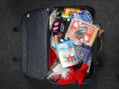 A luggage case containing magic tricks and accessories