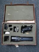 A vintage leather case containing Seimar 300mm camera lens plus
