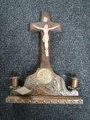 An oak table crucifix with copper handle sconces